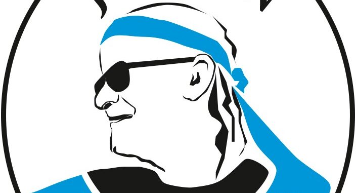Piirros Juice Leskisestä aurinkolaseissa ja sinisessä huivissa